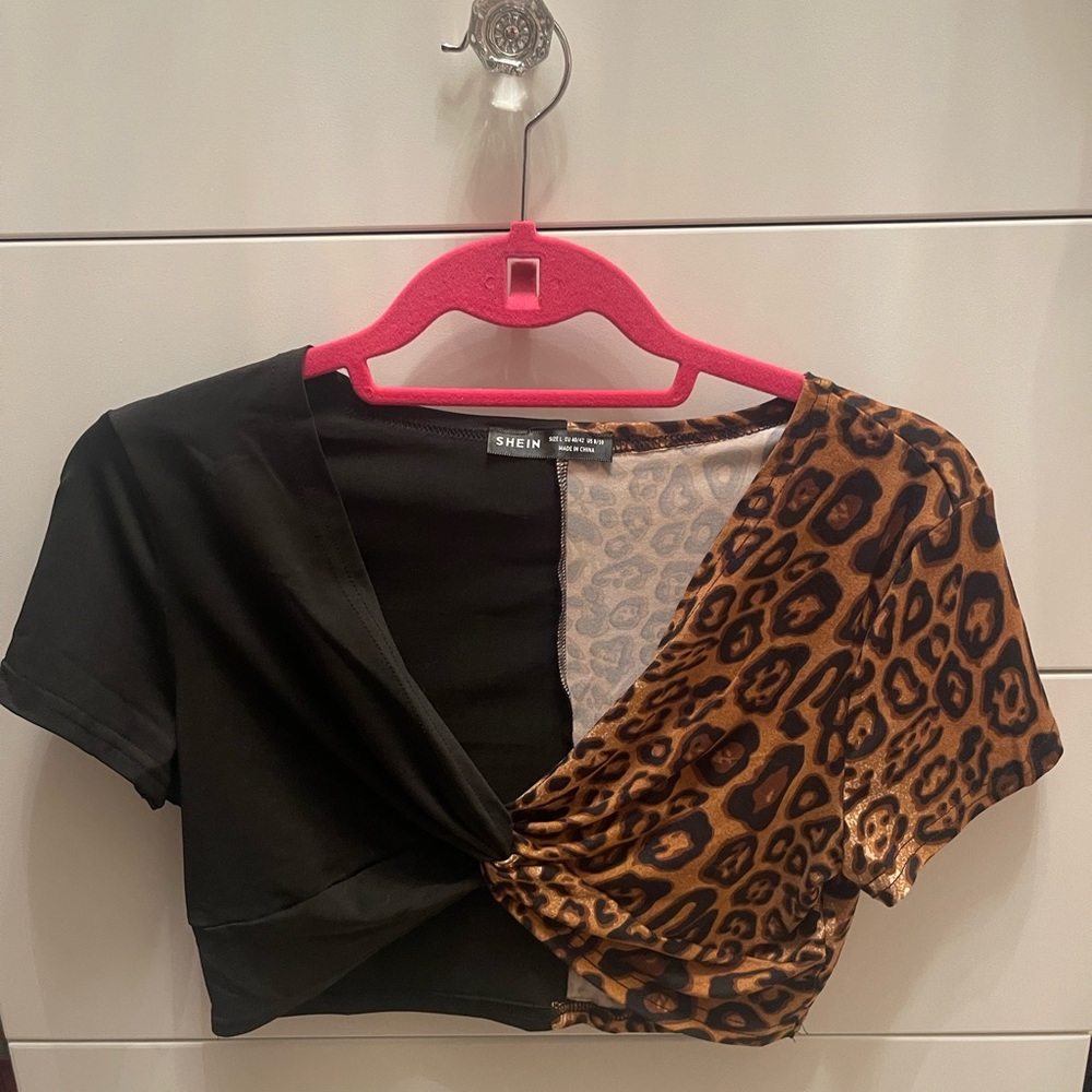 Fun black and cheetah going out top ONLY wore once! Super comfy